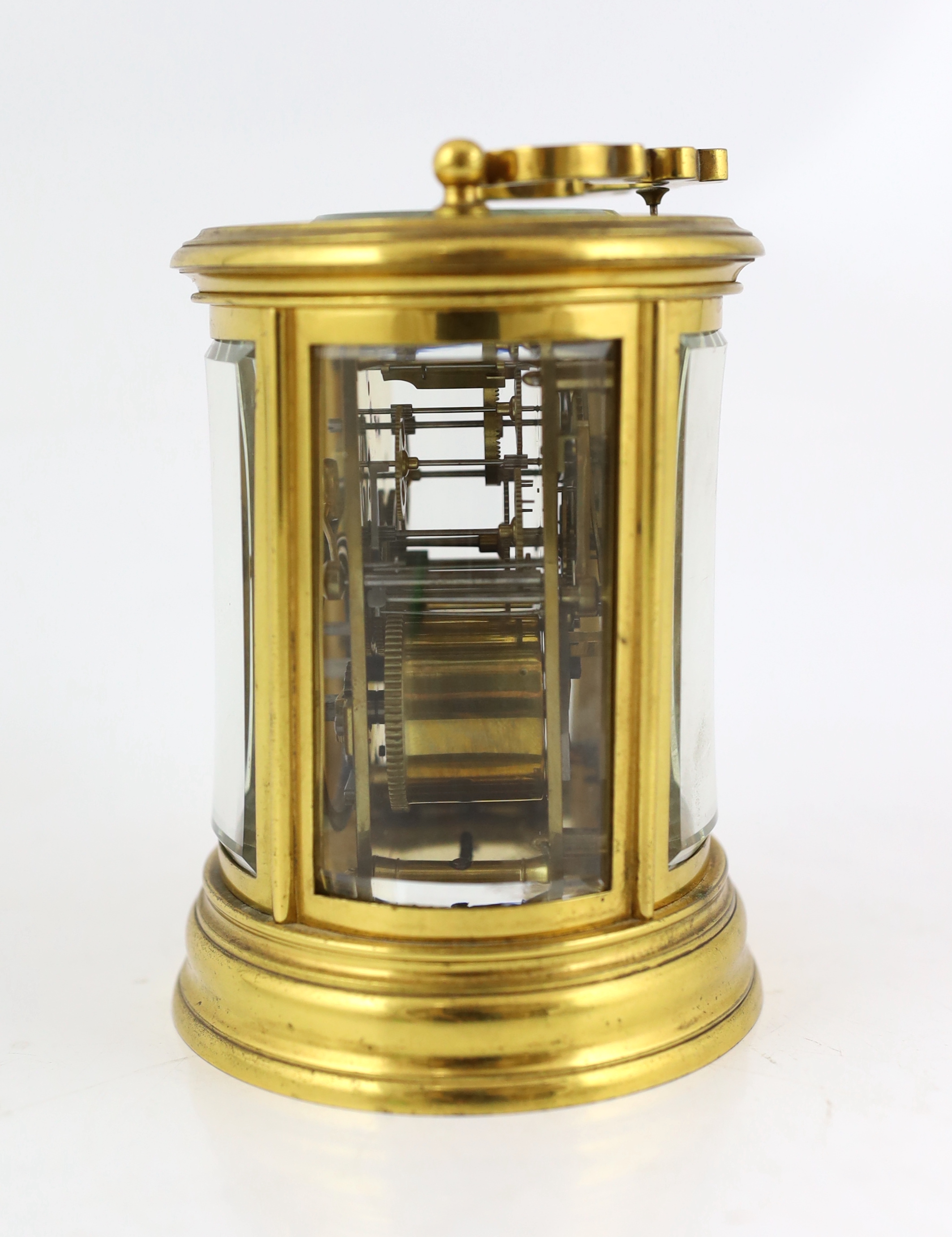 A late 19th century French brass oval cased eight day hour repeating carriage clock, by Henri Marc, 13.5cm high, Please note this lot attracts an additional import tax of 5% on the hammer price